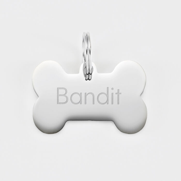 Médaille personnalisée métal argenté gravé os 36x25 mm - nom