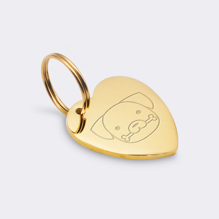 Médaille chien gravée acier doré coeur biais 19x21 mm