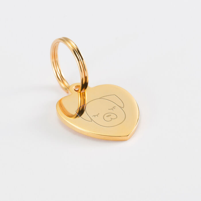 Médaille chien gravée acier doré coeur 18x22 mm